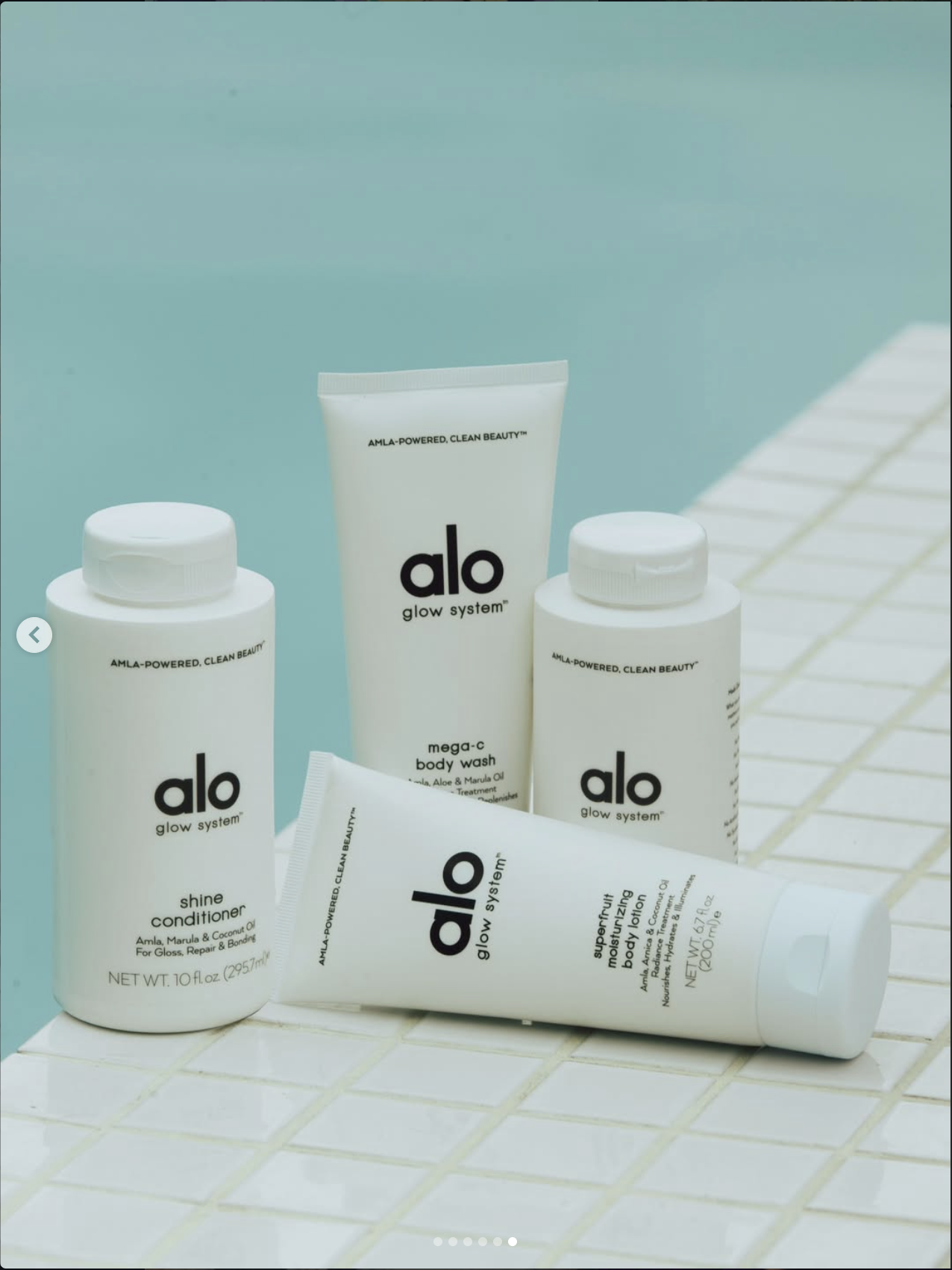 Body care tubes styled on a white surface