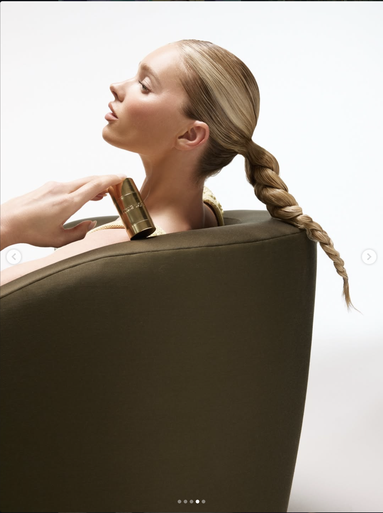 Profile beauty portrait against a sculptural seat